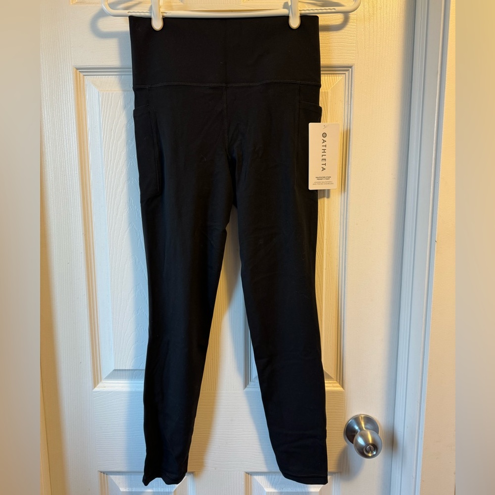 Athleta salutation stash pocket II tight